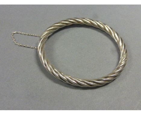 A silver bangle 