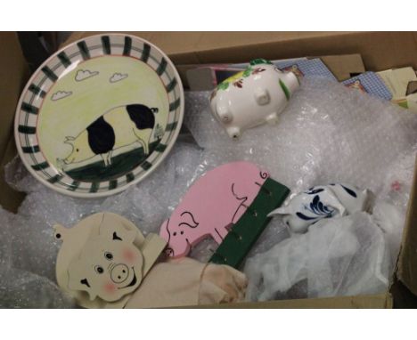 A collection of ceramic model pigs 