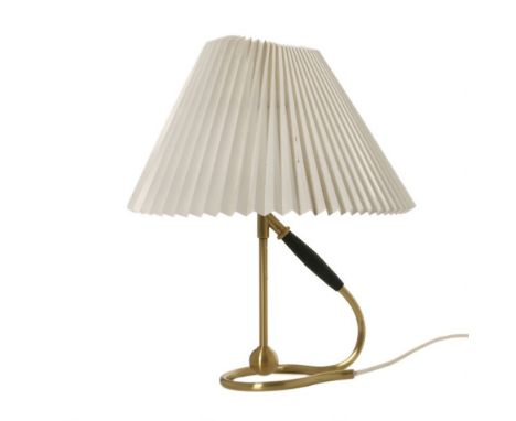 Kaare Klint for Le Klint, a 'Model 306' brass table lamp with a black plastic handle   CONDITION REPORT:  Ordinary patina, in