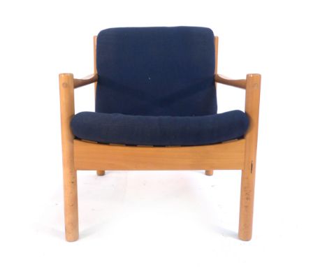 A 1980's Ercol beech lounge armchair with loose cushions   CONDITION REPORT:  Scuffs and some discolouration, structurally so