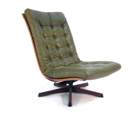 A 1960/70's green button upholstered and bentwood lounge chair on a simulated rosewood five star swivel base by Gote Mobler  