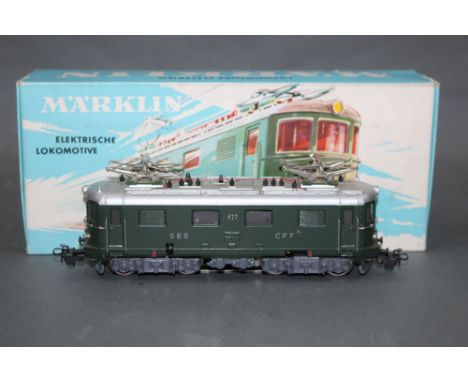 A Marklin HO scale SBB CFF electric locomotive (3014), retaining its origional cardboard picture box 
