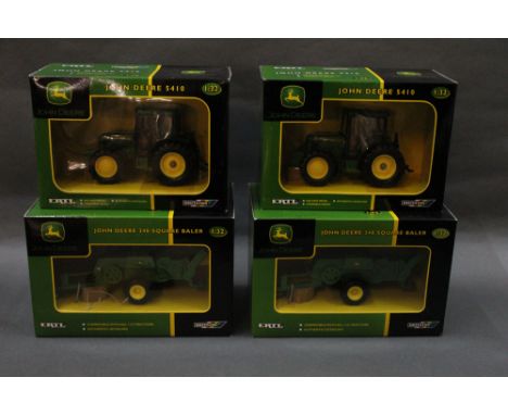 Two Britain's Ertl John Deere 54101:32 scale model tractors, and sold together with two 348 square balers, all keeping their 