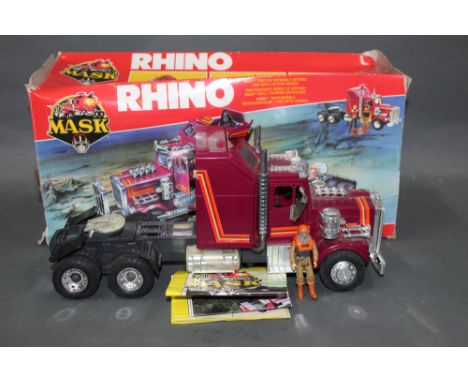 A 1980's Kenner Mask "Rhino", comprising a tractor, rigg/mobile defence unit with single action figure, retaining its origina