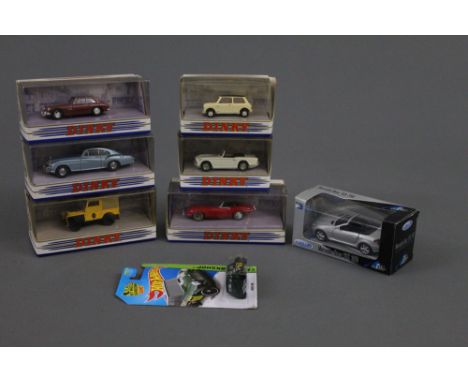 A group of six Matchbox Dinky diecast model cars, all displayed in their original boxes, a Welly Mercedes-Benz SLK 350 scale 