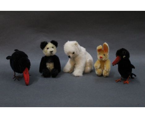 A group of three mid-late 20th century plush and fur animals, to comprise a Dean's style black and white panda with boot butt