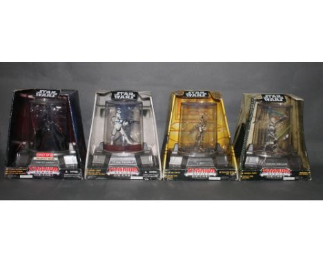 A group of four Galoob Star Wars Titanium Series diecast collectable models of characters, to comprise Darth Vader, Clone Tro