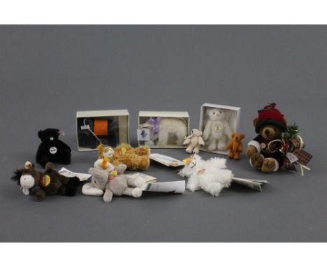 A group of Steiff Club Gift teddy bears, Steiff Original Cosy Friends, and miniature teddy bears