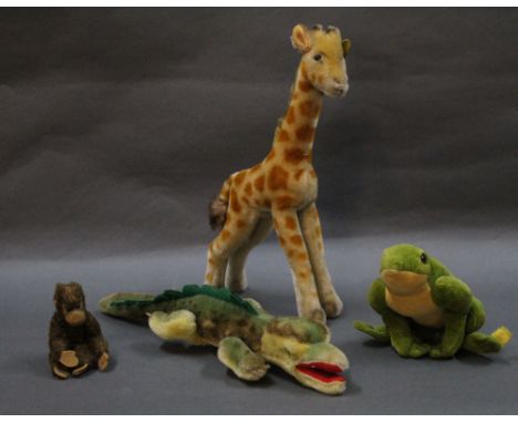 A group of four late 1940's-70's Steiff animals, to comprise a 1950's giraffe, measuring 28cm tall, a 1968-74 Gaty crocodile,