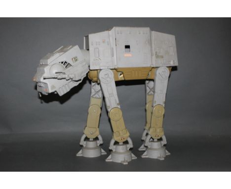 A 1980's Kenner Star Wars AT-AT Walker, unboxed and measuring 46 cm tall