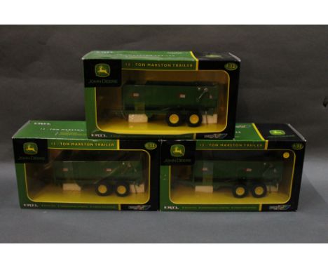 A group of three Britain's Ertl John Deere 1:32 scale diecast model 12- ton Marston trailers, all displayed in their original