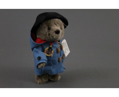 A Steiff "50th Anniversary of Paddington Bear" Teddy bear, exclusive to Danbury Mint, limited edition 3721, wearing a teal bl