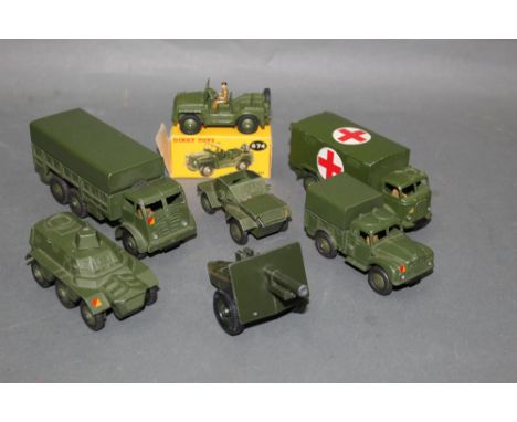 A group of six Dinky and one Britain's army vehicles and accessory, to comprise a boxed Austin Champ with figure, a 1 ton car