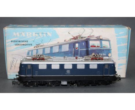 A Marklin HO scale DB class electric locomotive (3034), retaining a 3037 cardboard picture box