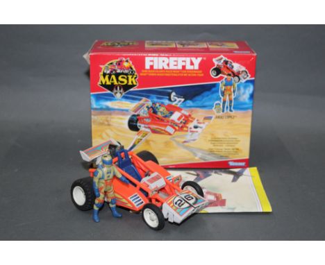 A 1980's Kenner Mask "Firefly", comprising a dune buggy and Julio Lopez action figure, retaining its original cardboard box a