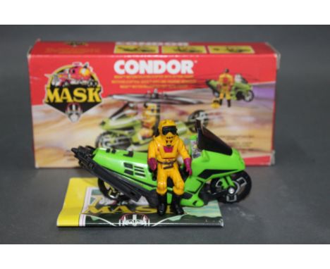 A 1980's Kenner Parker Mask "Condor", comprising a motorcycle/helicopter with action figure, and retaining its original cardb