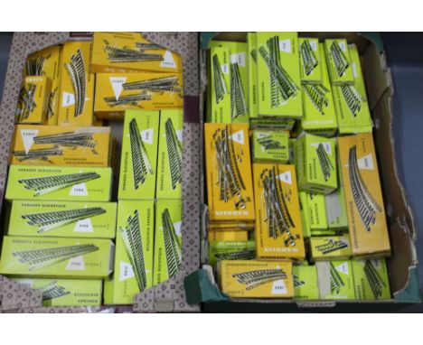 A group of 70 plus boxes of Marklin HO scale track sections and buffer stops, all retaining their original cardboard boxes  