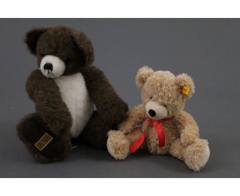 A Steiff "Fynn" Teddy bear, having a cuddly soft beige plush body and sold together with a limited edition Merrythought teddy