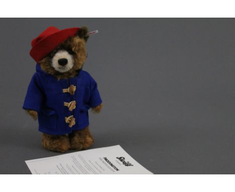 A Steiff "Paddington The Movie Edition" Teddy bear, exclusive to Danbury Mint, limited edition 744/5000, wearing a blue duffe