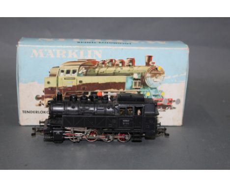 A Marklin HO scale 0-8-0 steam locomotive (3031), retaining its original cardboard picture box  