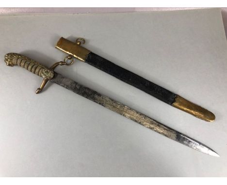 Militaria interest: British naval officers dirk and scabbard. With lion head pommel and mane. With the Naval crowned anchor i