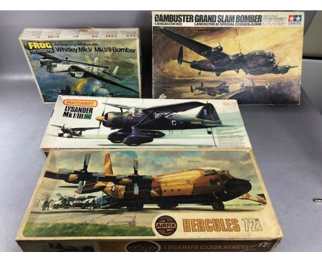 Four unassembled scale model planes: FROG Armstrong Whitworth 1:72, Matchbox Lysander MkI/III 1:32, AIRFIX Hercules 1:72, TAM