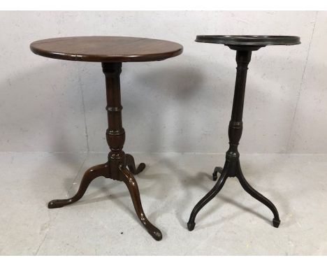 Two antique wine tables both on tripod legs