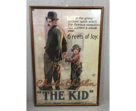 Framed vintage cinema advertising poster for Charles Chaplin in ''The Kid'', approx 96cm x 65cm
