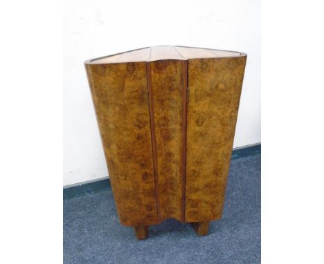 An Art Deco burr walnut double door cabinet 