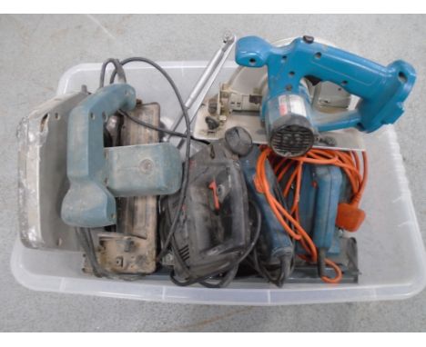 A box containing assorted power tools by Black &amp; Decker and Makita.