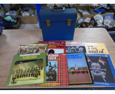 A small box of vinyl records together with an album of stamps and a file of First Day Covers.