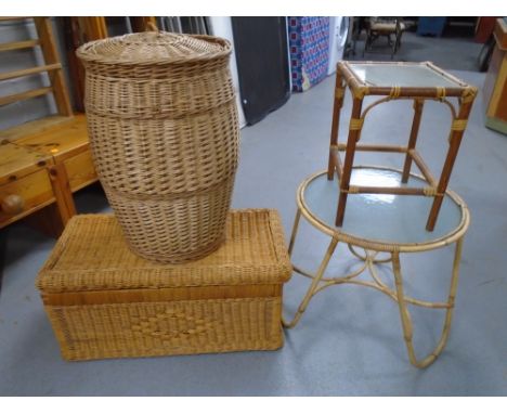 A bamboo and wicker circular glass topped occasional table together with a further lamp table, a wicker blanket box and laund