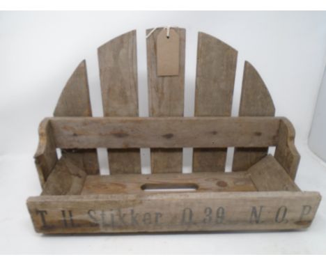 An antique wooden trough with advertising panel (width 43cm).