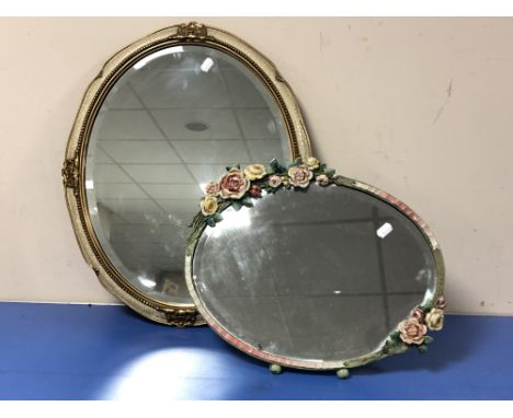 A Barbola dressing table mirror together with a cream and gilt framed oval mirror.