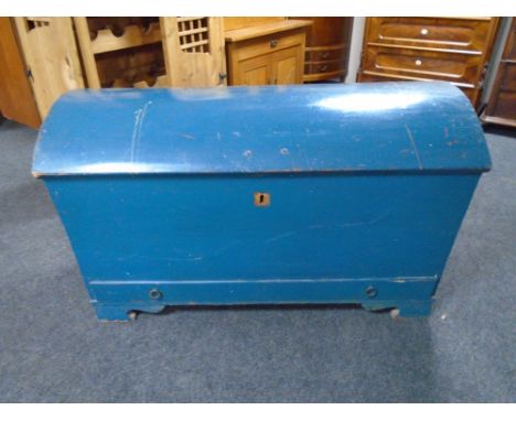A 19th century painted oak dome topped shipping trunk 