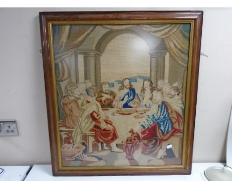 A Victorian tapestry in rosewood frame depicting figures around a table, 66cm by 72cm.