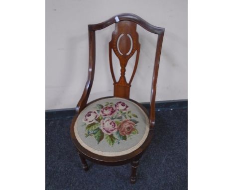 A 19th century beech wood bedroom chair with tapestry seat