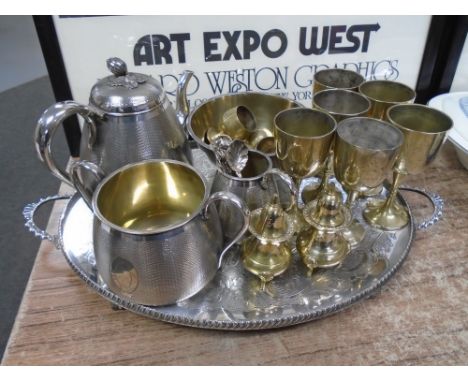 A silver plated tray together with further plated wares including a four-piece tea service, goblet, salt and pepper pot etc.