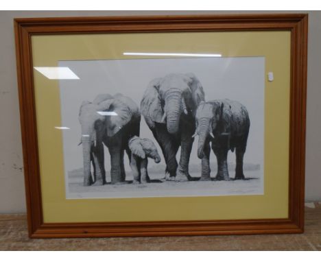 An indistinctly signed limited edition print : Approaching the Watering Hole, no. 140 of 500, in frame and mount.