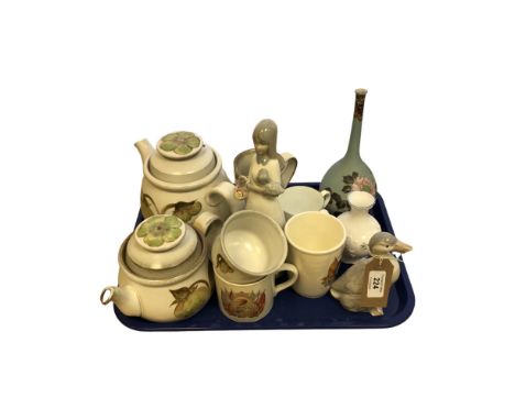 A four-piece Denby tea service, a Spanish lady figure, a china duck ornament, a 1953 Newcastle Upon Tyne commemorative mug, a