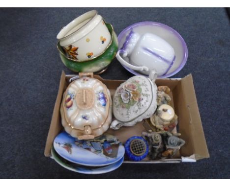 A box containing an encrusted jardiniere, ceramic jar, jug and basin, ceramic figures.