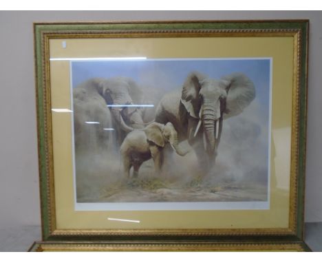 A signed limited edition print after D. V. Heerds : An elephant herd, no. 158 of 400, in frame and mount.