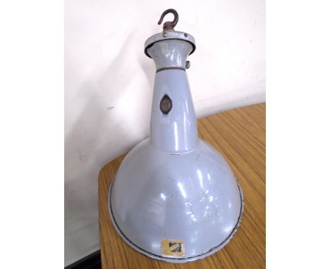 An mid-20th century industrial metal light fitting.