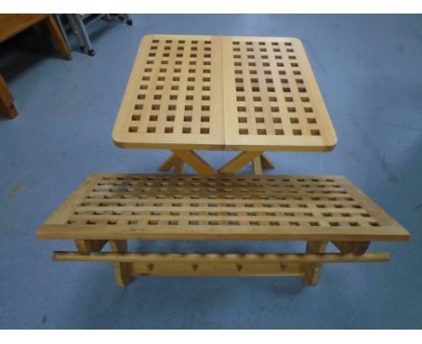 A folding lattice occasional table together with matching wall shelf with coat hooks.