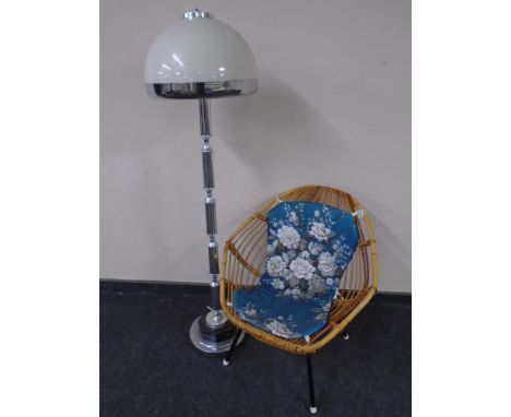 A mid century bamboo and wicker chair on metal legs together with a 1970's standard lamp  CONDITION REPORT: The lamp appears 