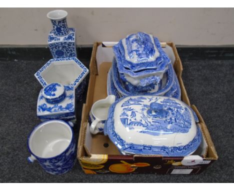 A collection of blue and white china, tureens, plates, antique willow pattern items, blue and white caddy etc.
