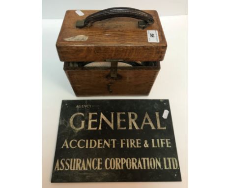 A vintage Toulet Imperator McMillan's improved patent pigeon timing clock No. 128256 in an oak case bearing label inscribed "
