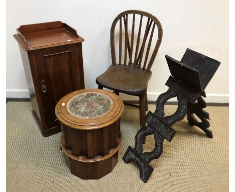 A mahogany pot cupboard, cylindrical commode stool, stick back chair, carved Koran stand, painted tin wall clock and wall mou