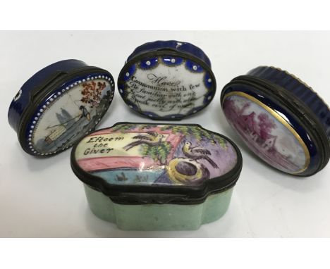 A collection of snuff or patch boxes including a Bilston type enamel box decorated with “Two nesting birds”, inscribed “Eftee