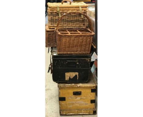 A painted metal trunk, two canework baskets, canework six bottle wine carrier, Victorian wirework and brass fender, four vari